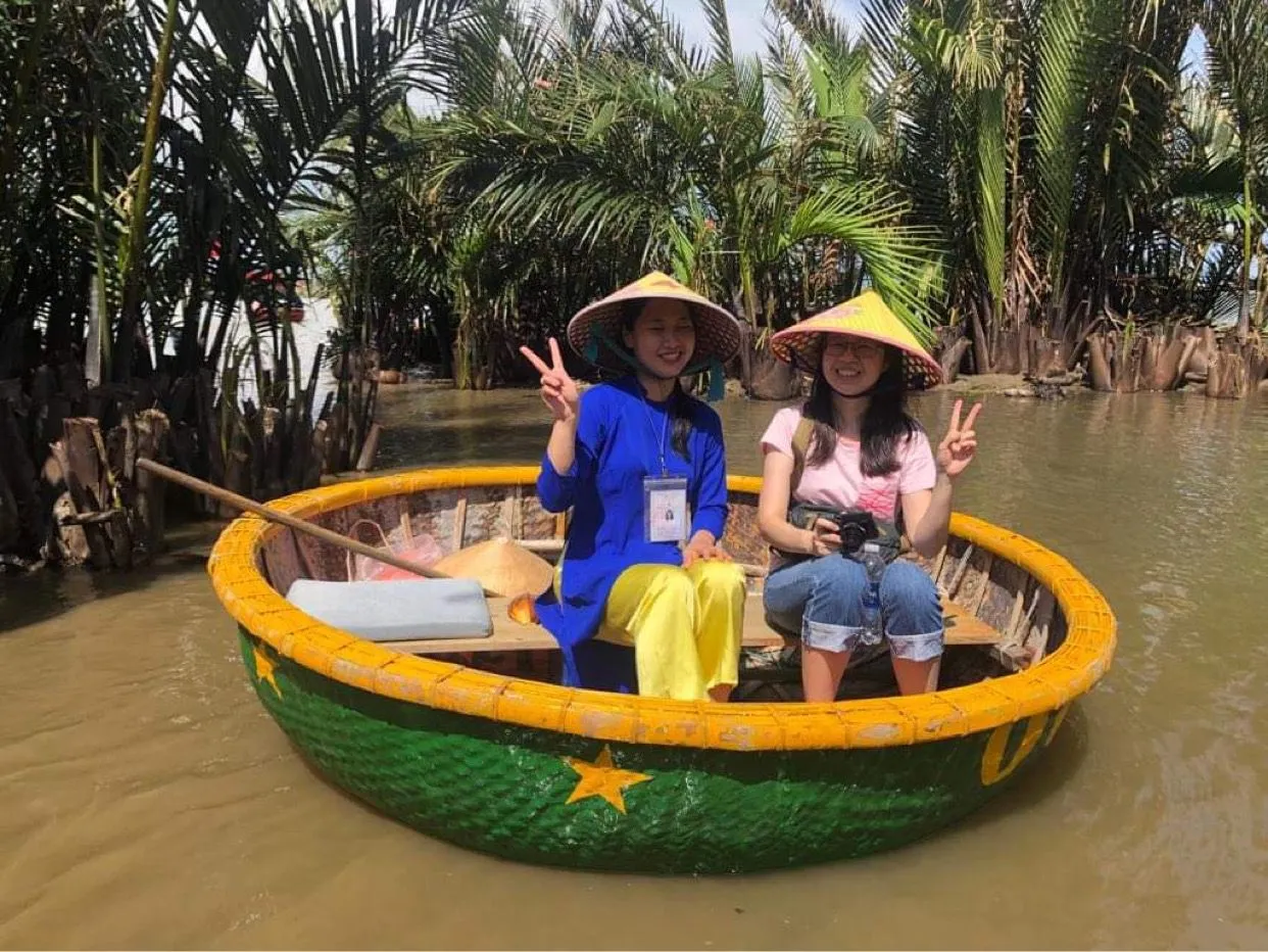 Ao Dai rider guiding guests through Hoi An rice paddies