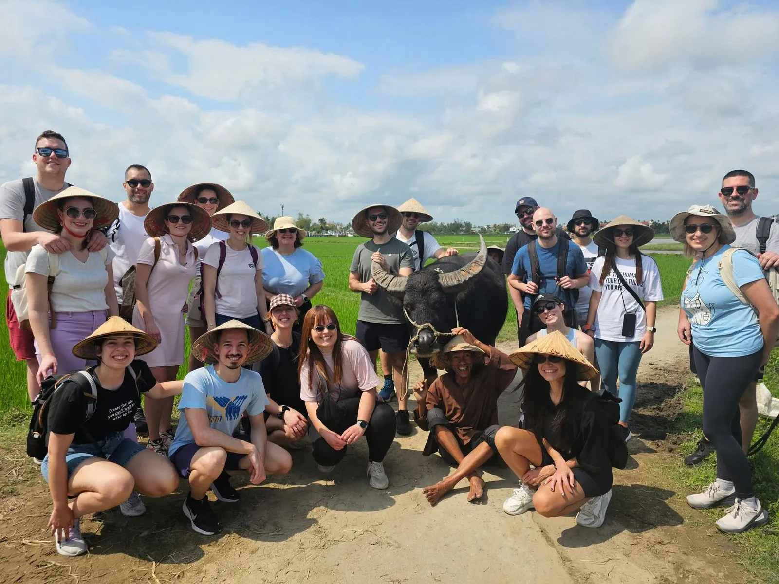 Ao Dai riders guiding a Hoi An water buffalo tour